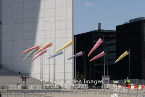 In front of the Grande Arche wind socks by Daniel Buren