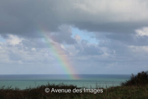 Rainbow forming over the anche, Channel, near Etretat