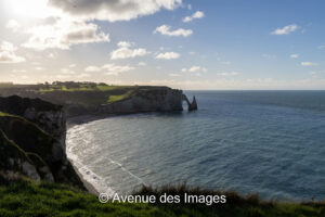 Falaise d'Aval, Aiguille and bay at high tide from the Amont headland in Etretat